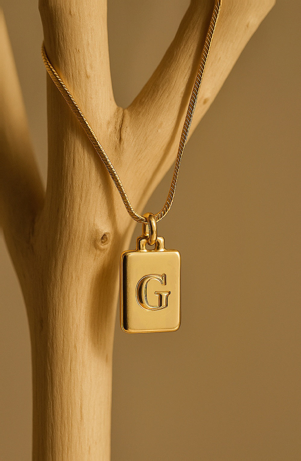 Gold-plated letter tag necklace